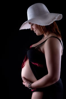pregnant woman with hat