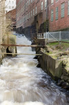 rushing water rushing down from a factory