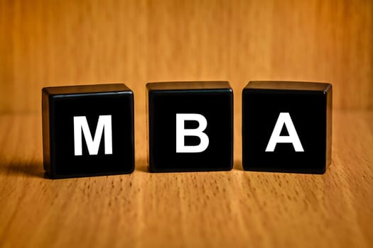 MBA or Master of Business Administration text on black block