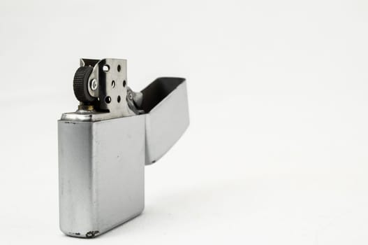 Vintage Zippo Style Lighter On a White Background
