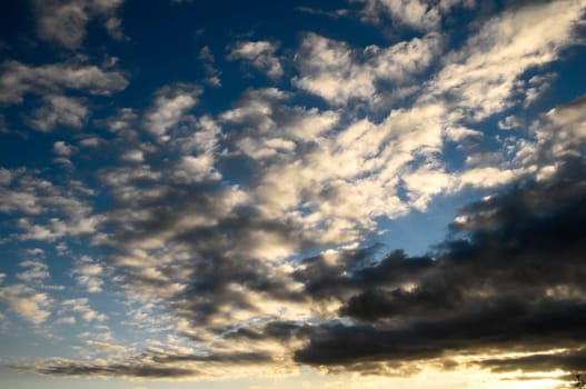 Cloudscape, Colored Clouds at Sunset near the Ocean