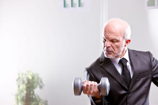 weightlifting business man in action looking at his shot