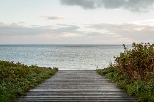 steg am wasser in the autumn ostsee sea sea clouds weather beach