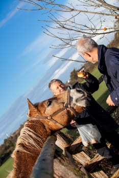 older seniors couple happy relaxed in the nature in free leisure holiday rest