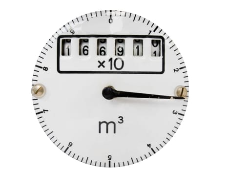 frontal close-up of an old enamelled dial with hands and roller mechanism insulated to white
