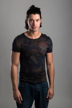 Portrait of handsome Malaysian man wearing flowery top