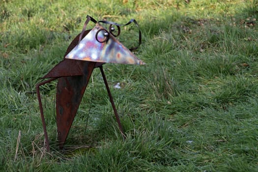 Metal bird in a garden in Extertal-Almena