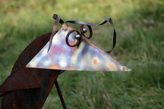 Metal bird in a garden in Extertal-Almena