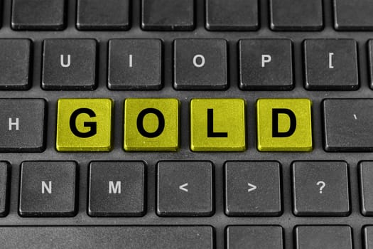 Gold word on keyboard, business concept