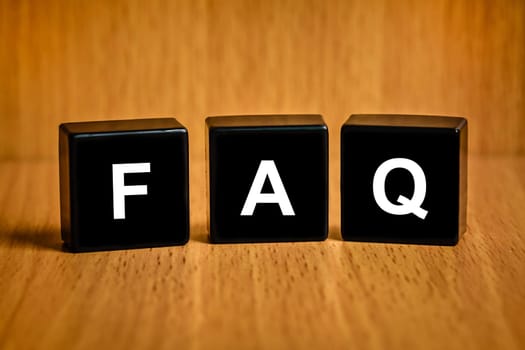 FAQ or Frequently asked questions text on black block