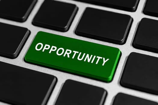 green opportunity button on keyboard, business financial concept