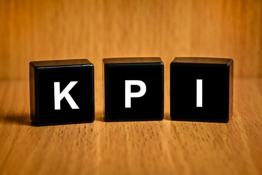 KPI or Key Performance indicator text on black block , business concept