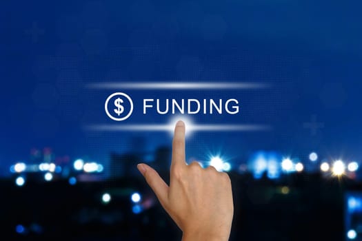 hand clicking funding button on a touch screen interface