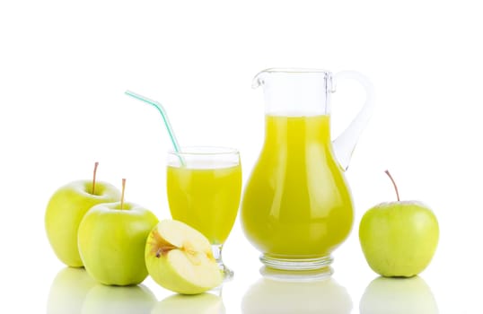 Juicing background. Fresh apples, glass with juice and carafe on white background. Healthy fruit eating and drinking..