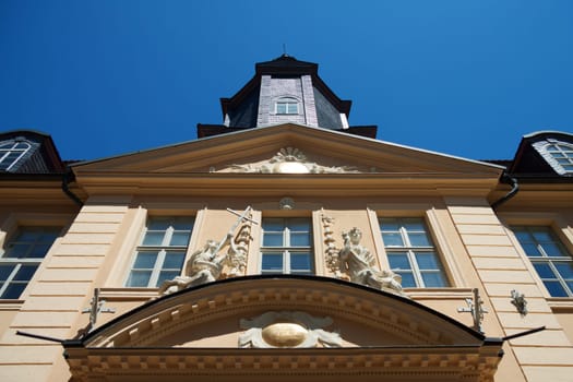 Townhouse in Gotha with tower and frieze taken from below