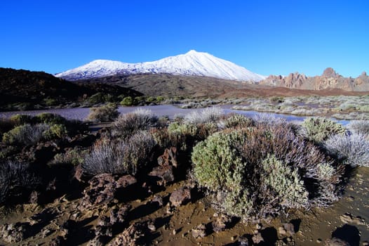 Backlight Sunbeams and Snow on Teide Tenerife Canary Islands