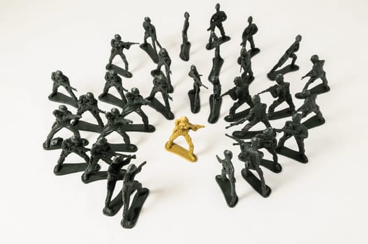 Plastic Lead Soldiers Representing War on a White Background