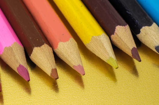 New Pencils Textured Set on a Colored Background