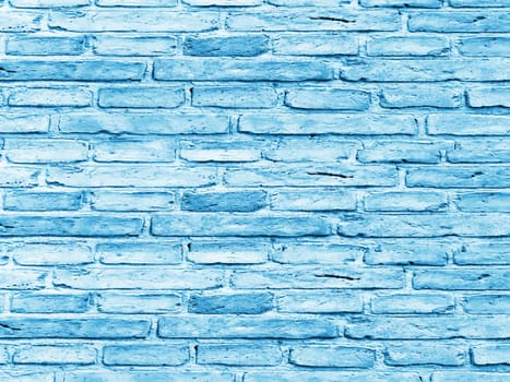 wall of small bricks stones as a background