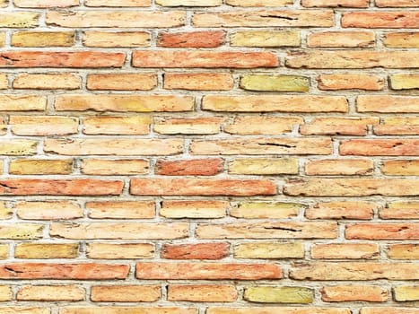 wall of small bricks stones as a background