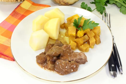 Wild goulash with turnip vegetables and potatoes