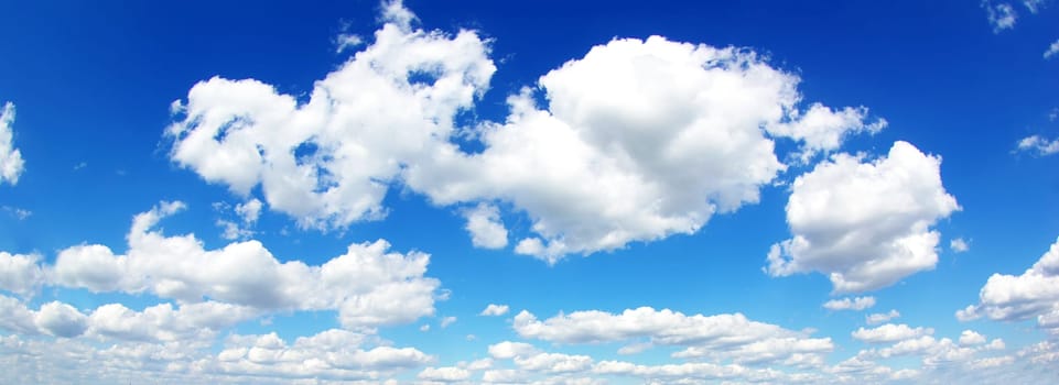 blue sky background with tiny clouds