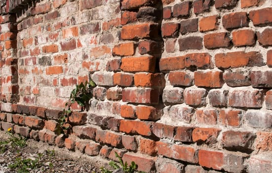 Old weathered grunge brick wall as background
