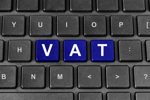 Vat or Value Added Tax word on keyboard, business concept