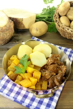 Wild goulash with turnip vegetables and potatoes