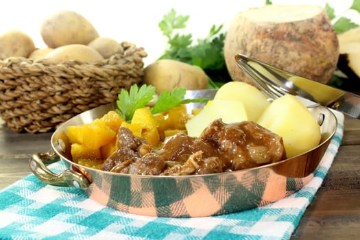 Wild goulash with turnip vegetables and potatoes