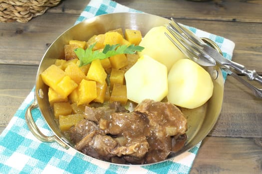 Wild goulash with turnip vegetables and potatoes