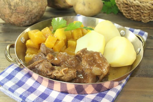 Wild goulash with turnip vegetables and potatoes