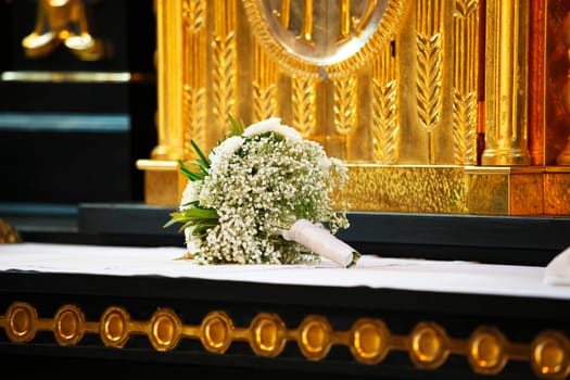 Bridal bouquet on the altar