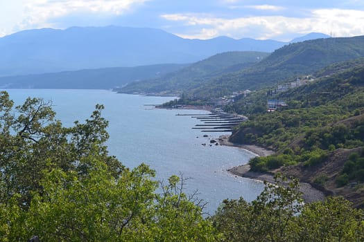 Sea, the city, the mountains in the summer - the top view.