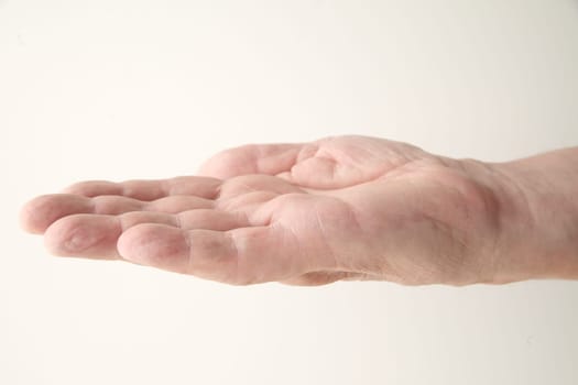 a man uses a gesture that can have many meanings