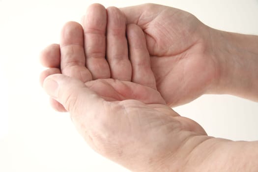 man with both hands facing up