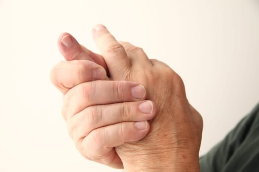 closeup of man with an aching little finger
