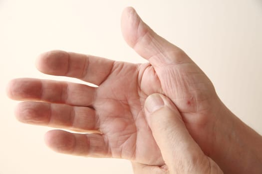 man's hand with new skin on a cut