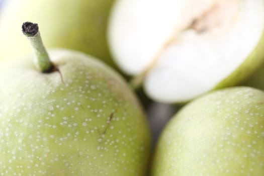 fresh green pears, shallow depth of field