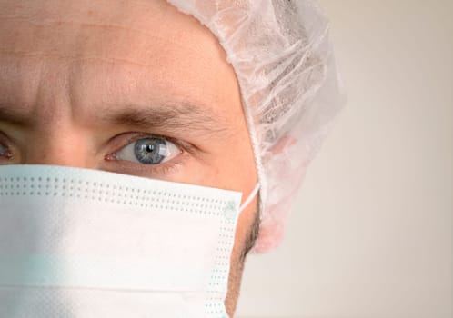 Mature male looking at camera at hospital, close up shot