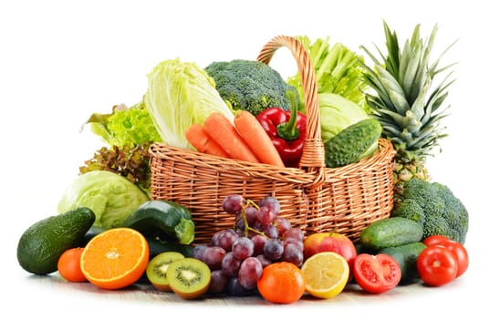 Wicker basket with groceries isolated on white background