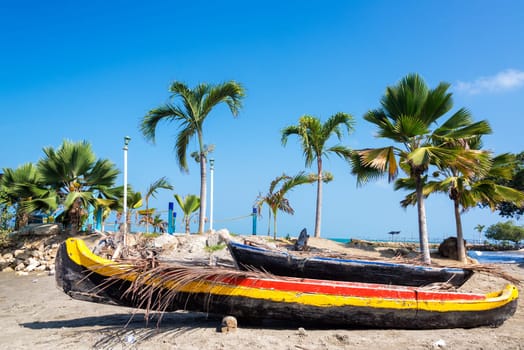 Canoes on a beach in Tolu, Colombia