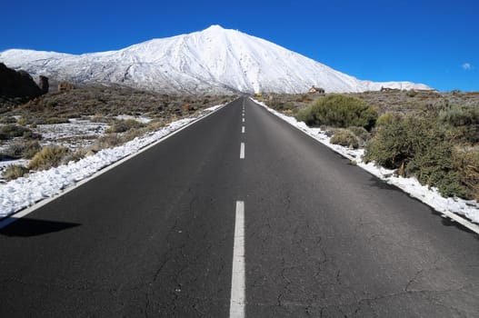 Snow Desert Lonely Road Landscape in Volcan Teide National Park, Tenerife, Canary Island, Spain