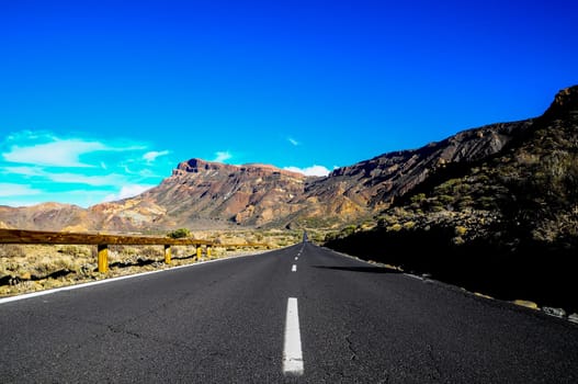 Desert Lonely Road Landscape in Volcan Teide National Park, Tenerife, Canary Island, Spain