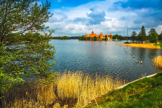 Panoramic view on Medieval old castle in Trakai, Lithuania placed on Galve lake..Island ancient castle are one of the most popular touristic destinations and cultural center in Lithuania.