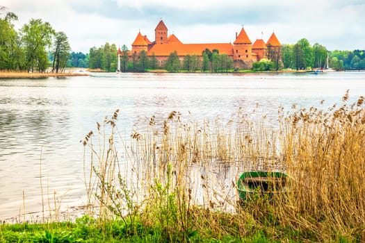 Panoramic view on Medieval old castle in Trakai, Lithuania placed on Galve lake..Island ancient castle are one of the most popular touristic destinations and cultural center in Lithuania.