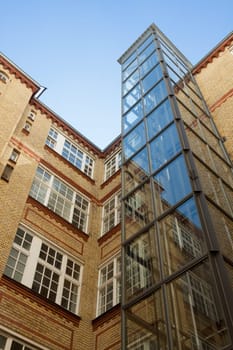 Glass elevator at an old building in Berlin