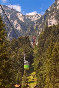 tourists ride the cable car