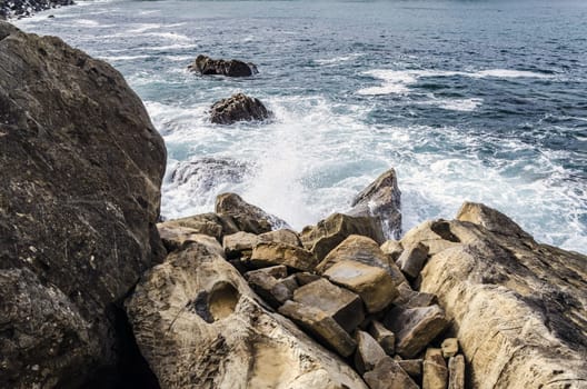 Beautiful and very detailed rocks, with nice, colorful and clean water background. This image is perfect for texture using and for precise and detailed working. The image is takken in Getaria city, Spain, at the Atlantic ocean.