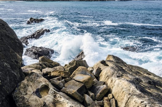 Beautiful and very detailed rocks, with nice, colorful and clean water background. This image is perfect for texture using and for precise and detailed working. The image is takken in Getaria city, Spain, at the Atlantic ocean.
